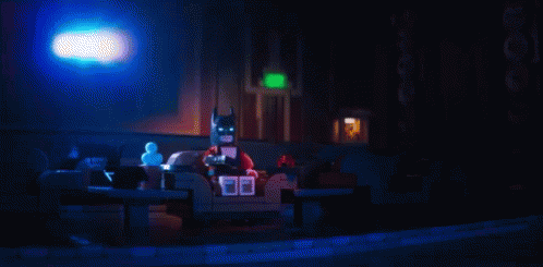 Let'S See What'S On GIF - Lego Batman Lego Batman Movie Watching Tv GIFs