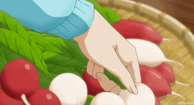 a person is picking radishes from a basket with the hashtag oishi-des below them