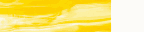 a close up of a yellow and orange light beam