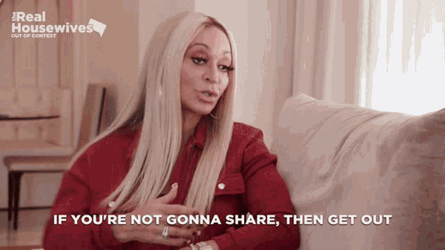 a woman sitting on a couch with the words " if you 're not gonna share then get out "