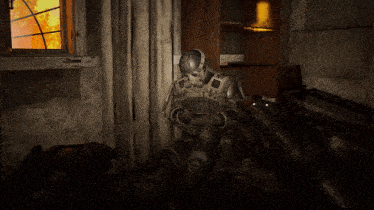 a soldier in a video game is sitting in front of a window with a fire behind it