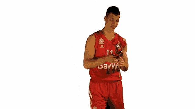 a basketball player with the number 11 on his shirt
