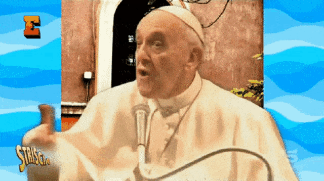 a man in a white robe stands in front of a microphone with the letters e and s on the bottom