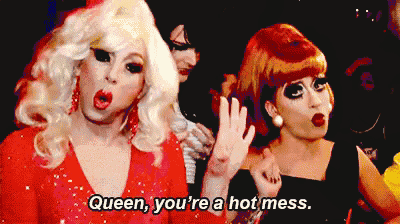 three drag queens are standing next to each other and one of them is saying queen you 're a hot mess .