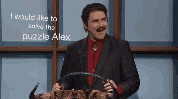 a man in a suit and red shirt holds a steering wheel in front of a puzzle alex