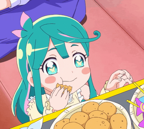 a girl with green hair and blue eyes is eating a cookie