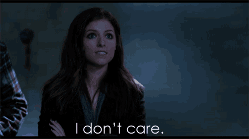 a woman says i don 't care while standing in the dark