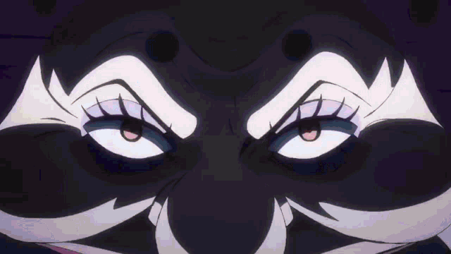 a close up of a cartoon character 's face with a very angry look on it .