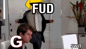 a man in a suit and tie is sitting in front of a white board with the words fud g and $ wit