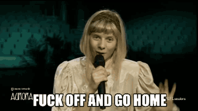 a woman singing into a microphone with the words " fuck off and go home " above her