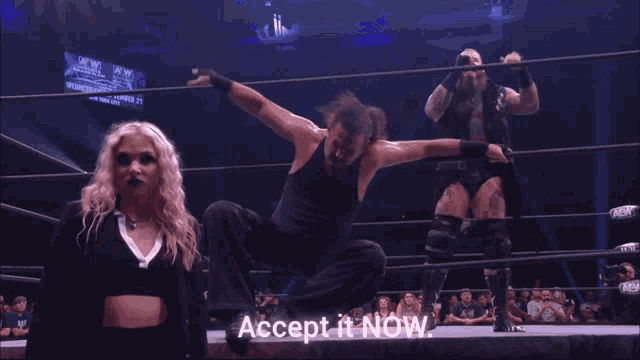 three wrestlers are in a ring with the words accept it now