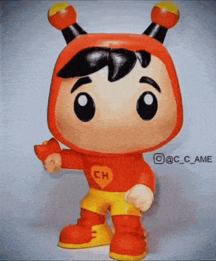 a funko pop of chapulín colorado with a heart on his shirt