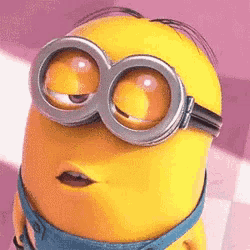a close up of a minion wearing glasses and making a funny face