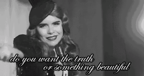 a black and white photo of a woman with the words " do you want the truth or something beautiful " on the bottom