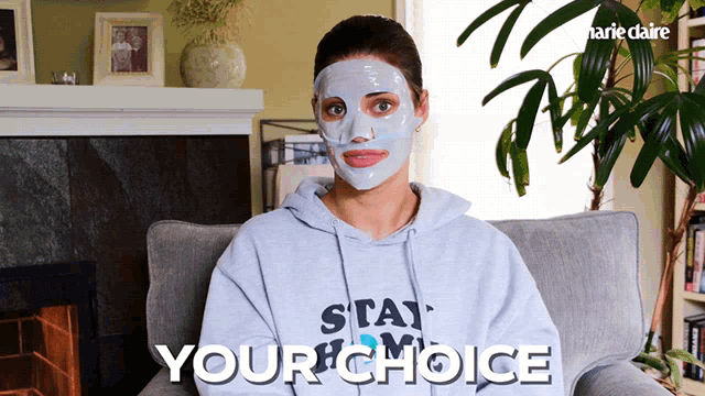 a woman with a mask on her face is sitting in a chair with the words your choice below her