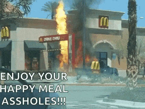 a picture of a mcdonald 's that is on fire