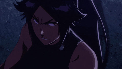 a dark haired anime character is surrounded by fire