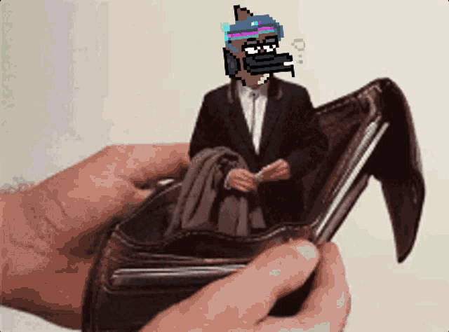 a hand holding an empty wallet with a pixelated man in a suit in it