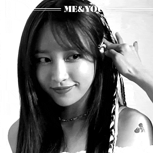 a black and white photo of a woman with the words me & you on the bottom right