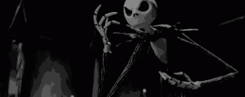 a black and white photo of jack skellington from the nightmare before christmas with a very large mouth .