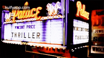 a neon sign for the palace theatre advertises thriller