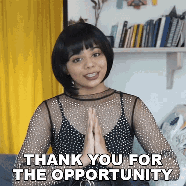 a woman says thank you for the opportunity with her hands together