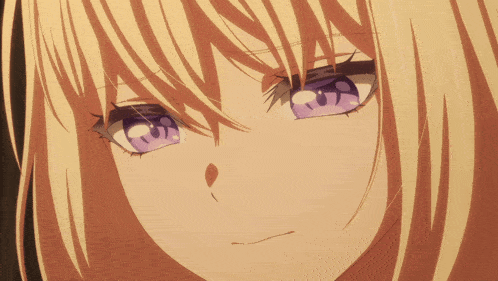 a blonde anime girl with purple eyes looks angry