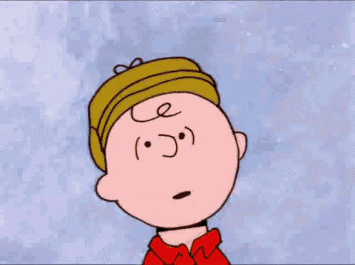 a cartoon character wearing a hat and a red shirt is laughing .