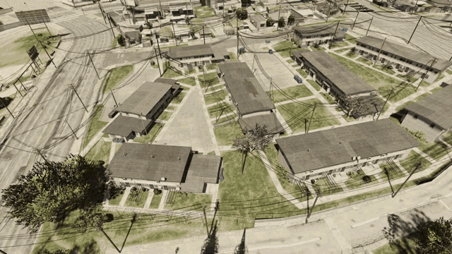 an aerial view of a residential area with lots of houses and trees