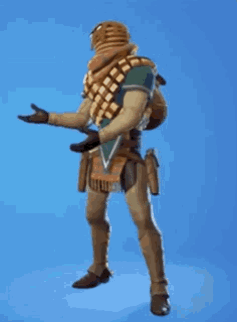 a man in a costume is standing in front of a blue background and waving his hand .