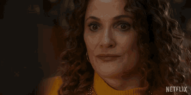 a woman says " the past is the past " in a netflix ad