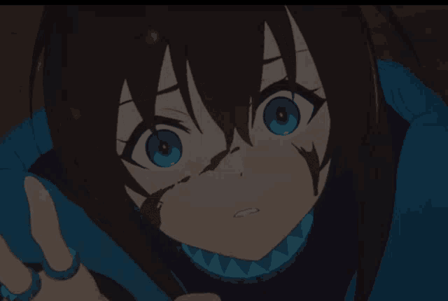 a close up of a girl with blue eyes
