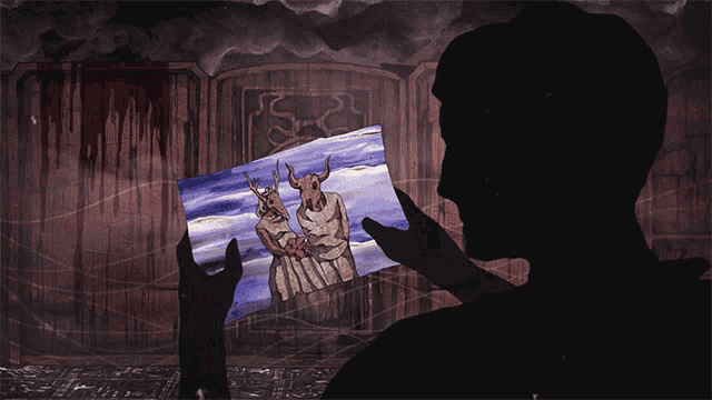 a silhouette of a person looking at a picture of a deer in a dark room