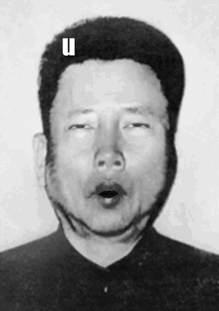 a man with the letter u on his forehead