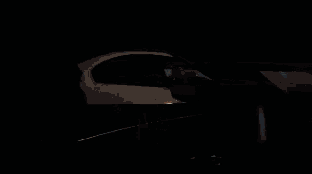 a blurred image of a car driving down a highway