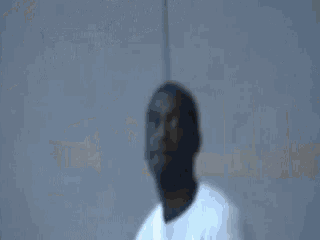 a man is jumping in the air with a basketball in his hands .