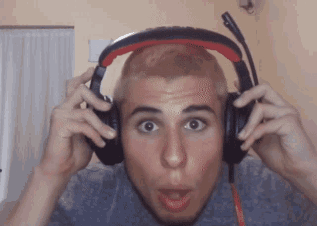 a man wearing headphones with a microphone on his head