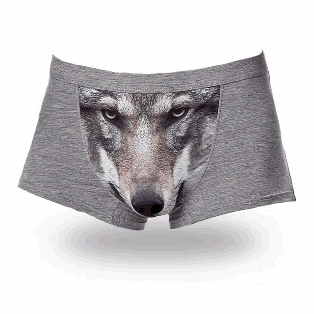 a pair of grey boxer briefs with a wolf face on them