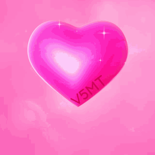 a pink heart with the letters v5mt on it