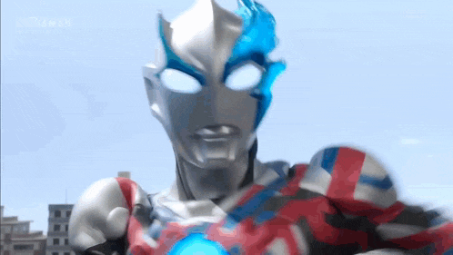 a close up of a cartoon character with blue eyes standing in front of a blue sky .