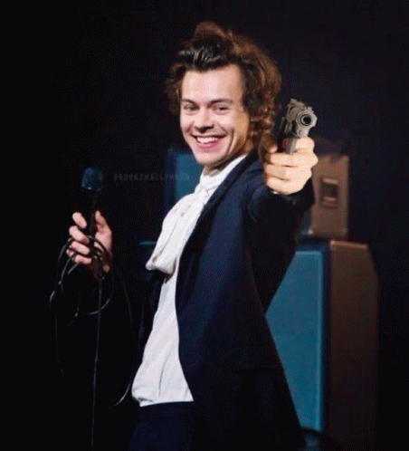 Harry Styles One Direction GIF - Harry Styles One Direction Gun GIFs