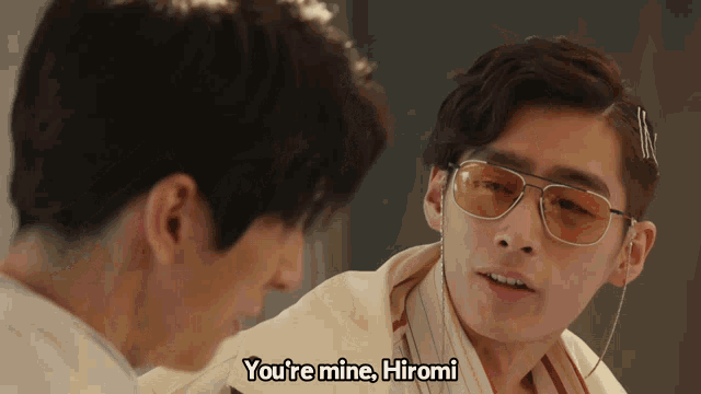 a man wearing yellow sunglasses says you 're mine hiromi