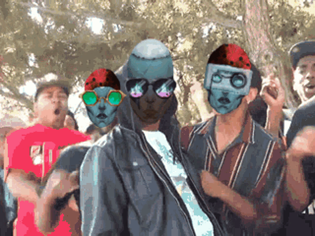 a group of people wearing masks and sunglasses are standing together