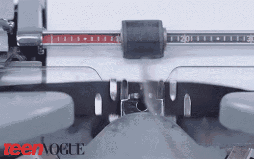 a typewriter with the words teen vogue on the bottom