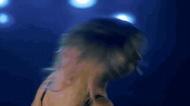 a blurry picture of a woman 's face and hair