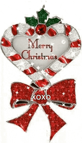 a candy cane in the shape of a heart with the words merry christmas xoxo