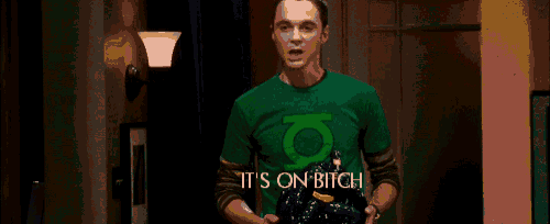 a man wearing a green shirt that says " it 's on bitch "