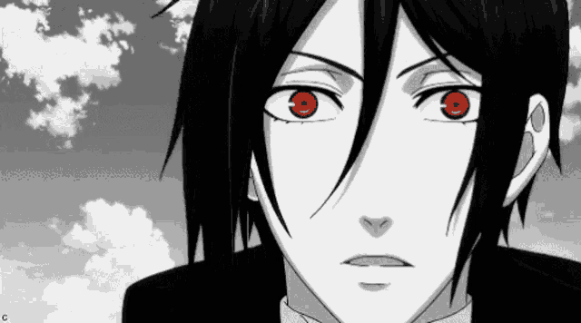 a black and white image of a man with red eyes
