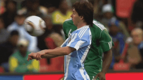 a man in a blue and white jersey with the number 11 on it
