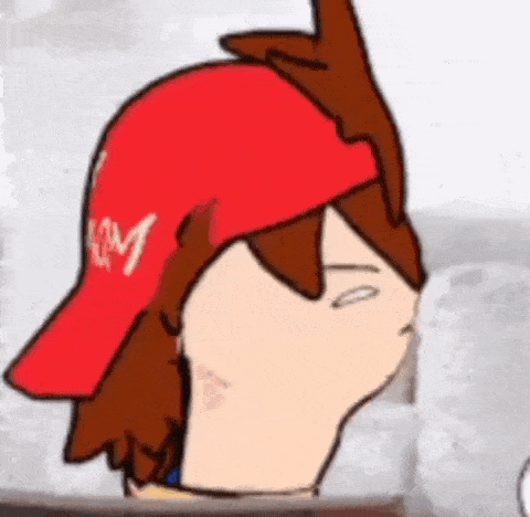 a cartoon character wearing a red hat with a crown on it .